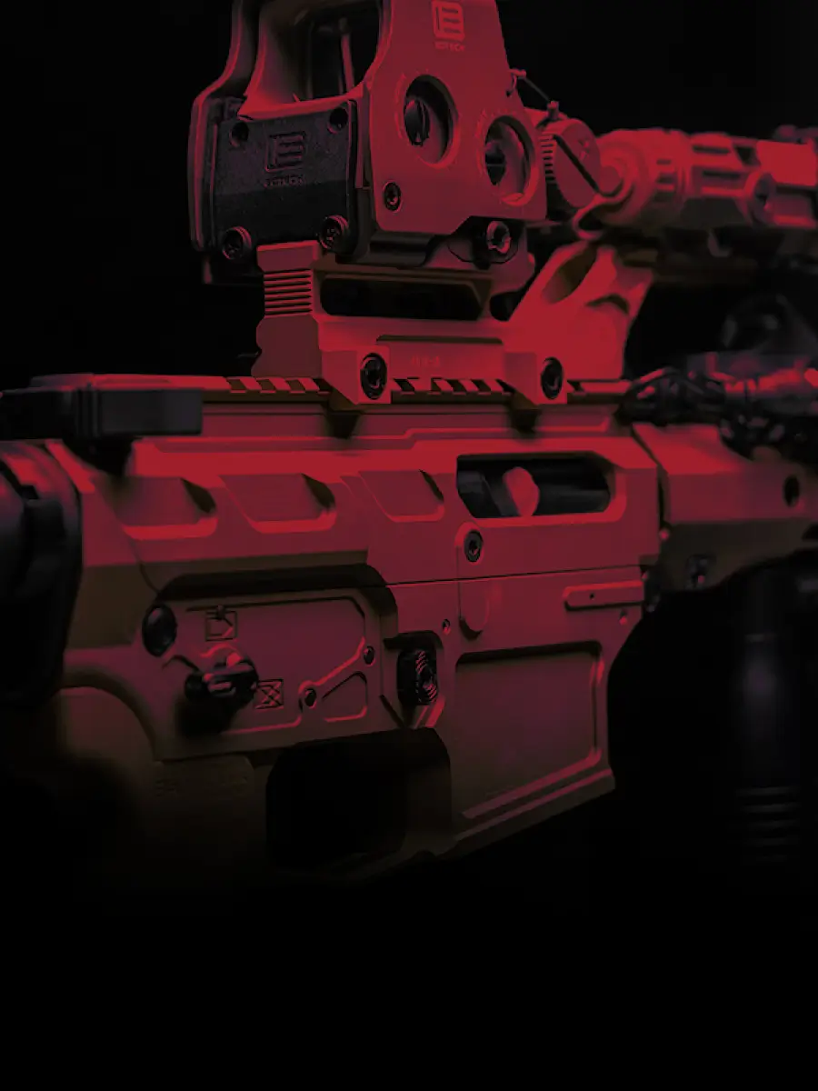 Close up of a modern firearm with red lighting